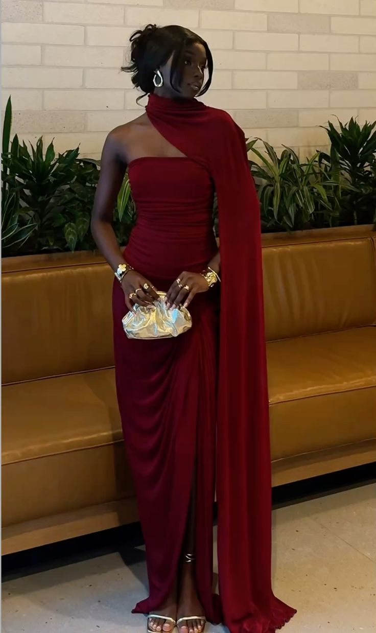 Burgundy one-shoulder cape gown