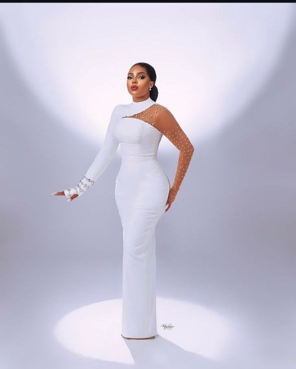 High-neck pearl-embellished column gown