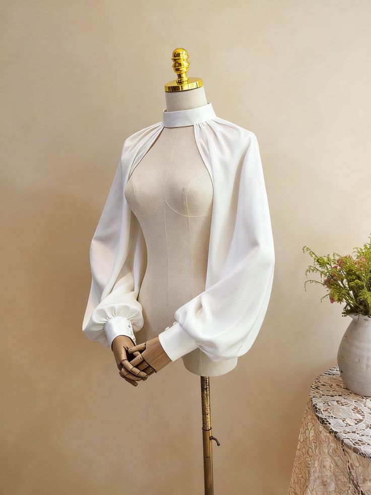 Ivory high-neck balloon sleeve shrug