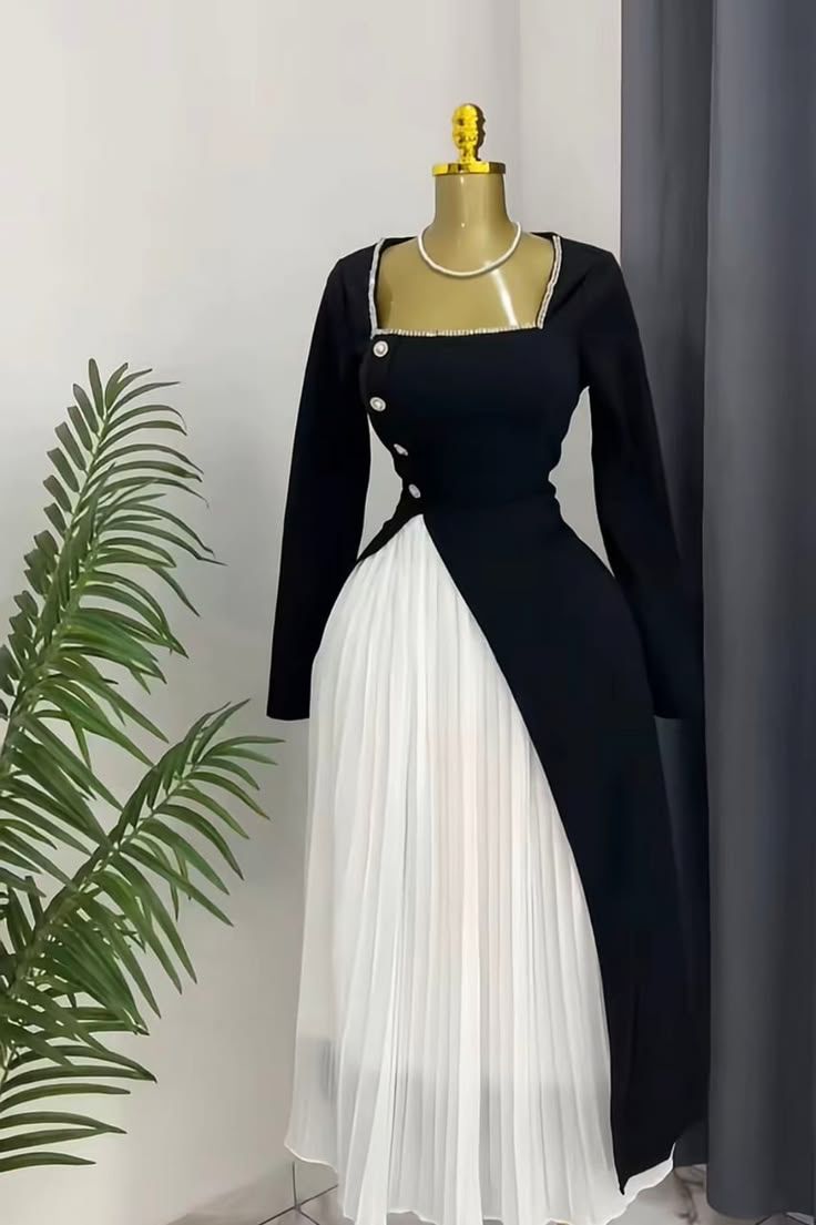 Black & white pleated panel gown