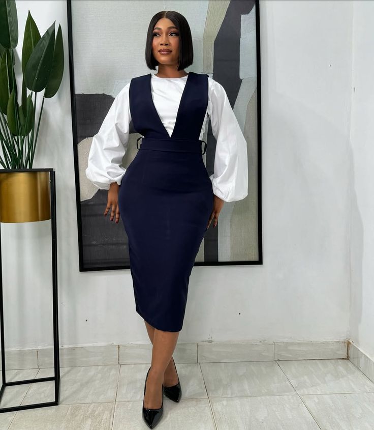 Navy pinafore midi with puff sleeves