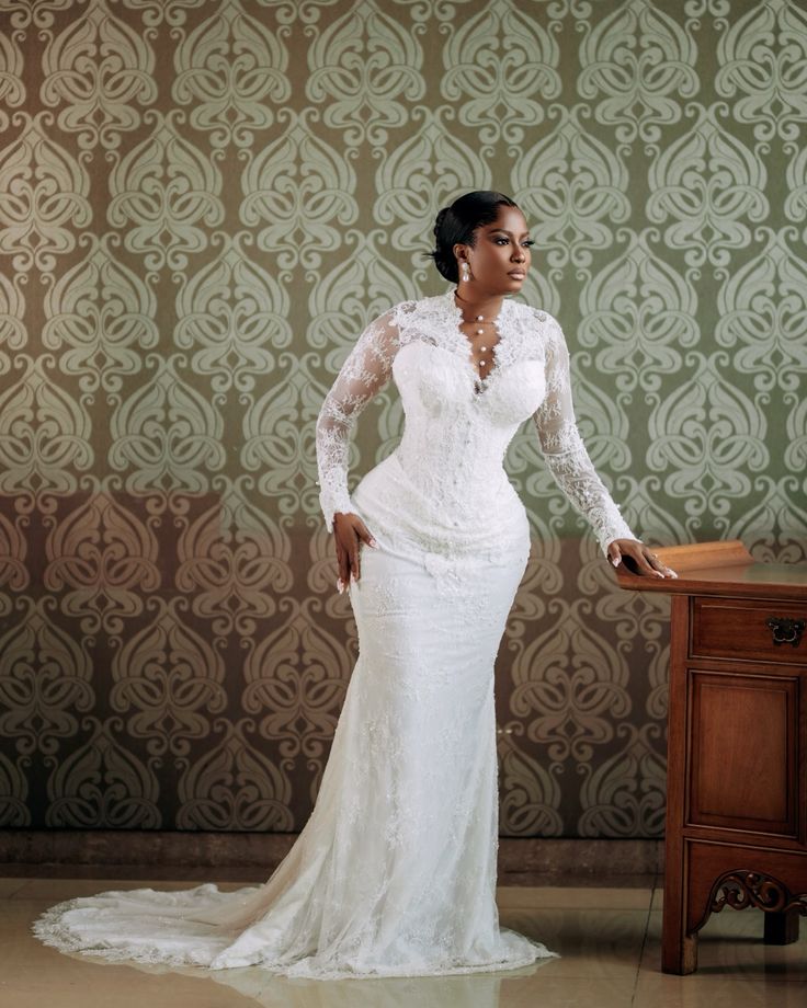 Long-sleeve lace mermaid wedding gown