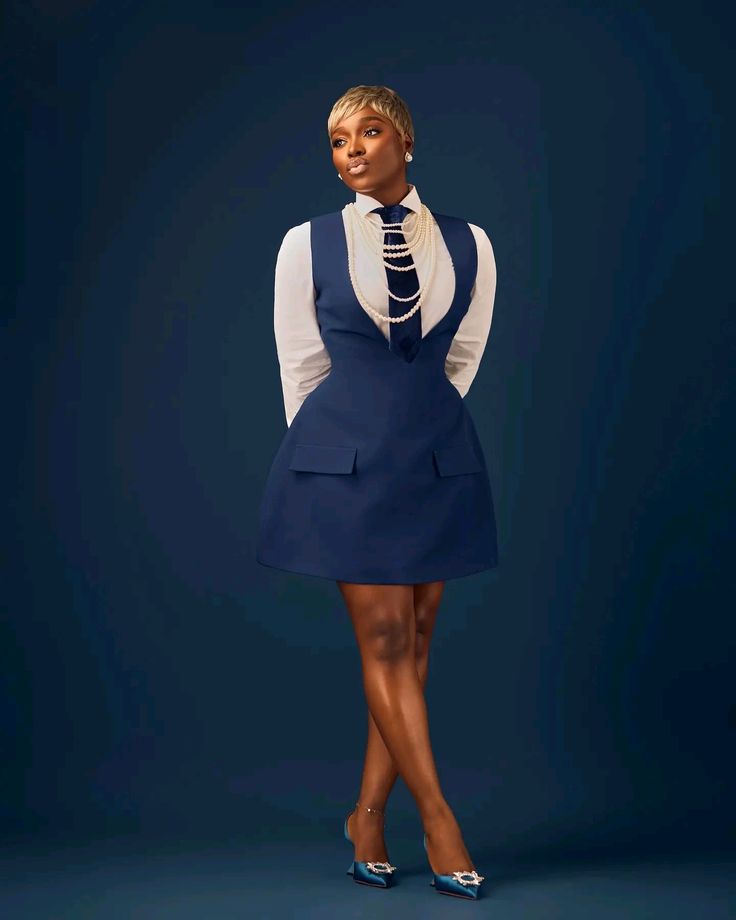 Navy pinafore mini with white shirt